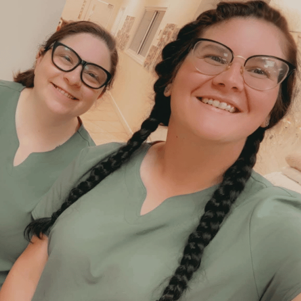 two veterinary team members taking a selfie